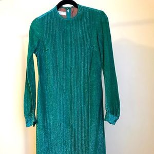 A shimmering dress being handed down from my grandmother. Size in 4-6